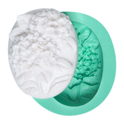 İlkbahar çiçeği figürlü silikon kalıp ve kalıptan çıkarılmış bahar çiçeği biblo örneği.