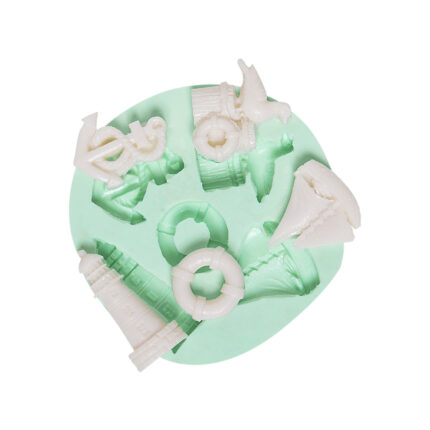 Deniz temalı silikon kalıbı: Deniz feneri, çapa, cankurtaran simidi ve yelkenli figürleri içeren kalıp.