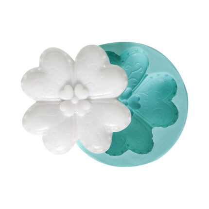 Kalpli çiçek biblo dökülmüş silikon kalıp. Romantik çiçek reçine süs yapımı için ideal.