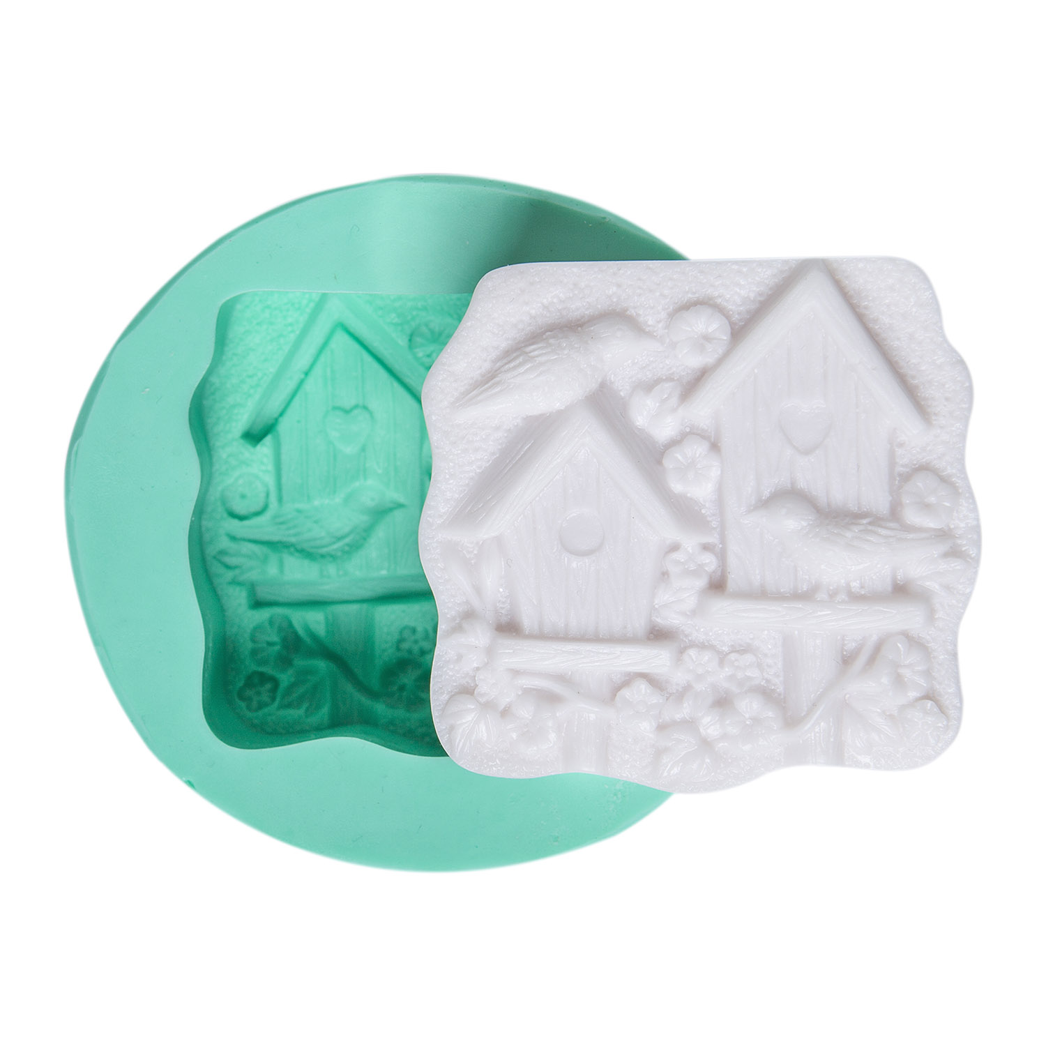 kus-evi-seklinde-silikon-alci-kalibi-kk-0740.jpg Kuş evi silikon kalıbı ve kalıptan çıkarılmış sabun objesi. Bahçe dekorasyonu için ideal.