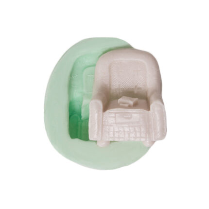 Üstünde çanta bulunan koltuk silikon kalıp modeli. Moda temalı dekor için koltuk figürü silikon kalıp.